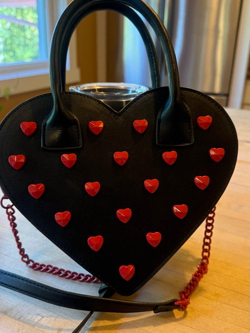 Betsey Johnson. Black Heart-Shaped Women's Handbag with Red Heart Studs